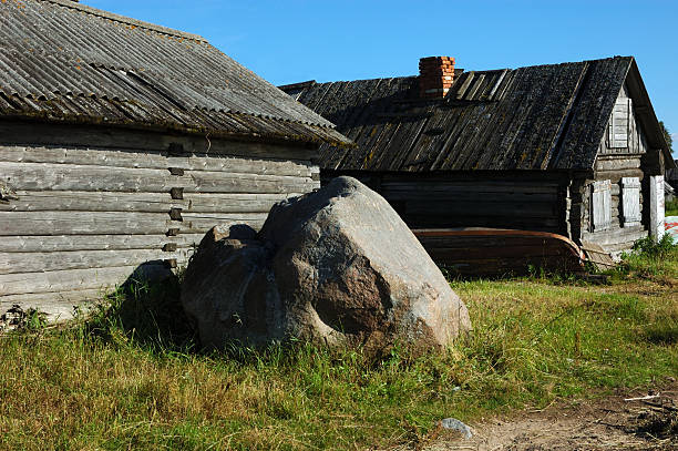 istock Old wooden shed and big stone 146760105