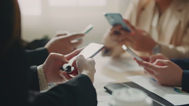 Group of people using Social media on phone