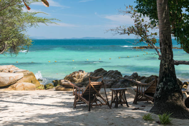 istock Deck chairs on beach by turquoise sea , Ko Man Klang, Rayong 1467605280