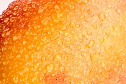 Ripe tropics mango fruits skin shot.