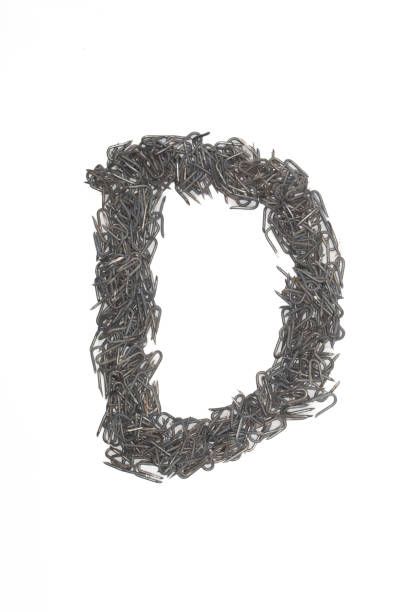istock artistic Letter D made from steel staples isolated on a white background write, font, type style, 1467605631