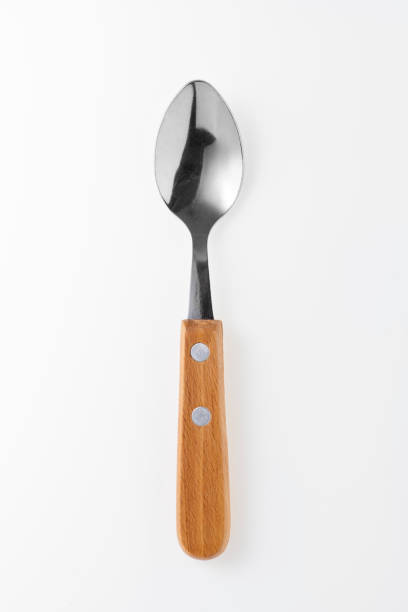 istock Wooden silver spoon isolated on white background. 1467605773
