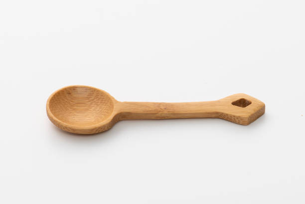 istock Wooden spoon isolated on white background. 1467605935