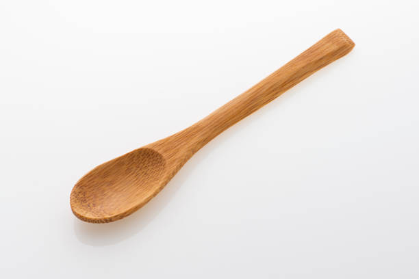 istock Wooden spoon isolated on white background. 1467605991