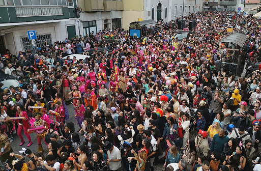 Crowd having fun at Carnival in Lisbon, Portugal