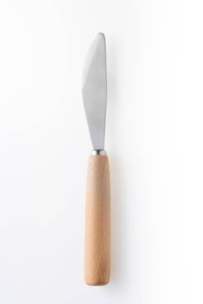 istock Wooden silver knife isolated on white background. 1467606670