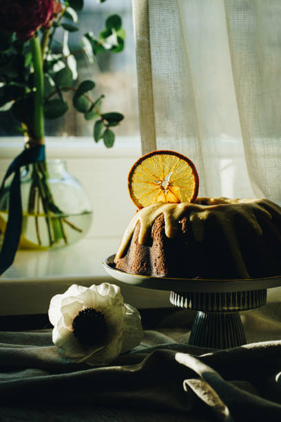 istock Still life with bundt cake and flowers 1467606800