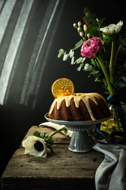Still life with bundt cake and flowers