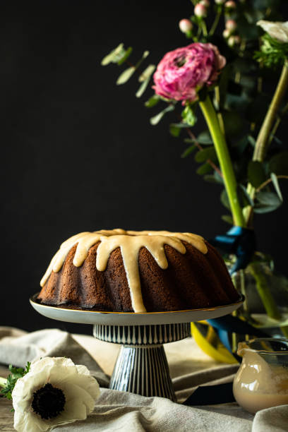 istock Still life with bundt cake and flowers 1467606883