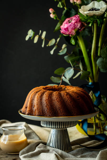 istock Still life with bundt cake and flowers 1467606896