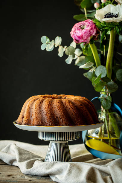 istock Still life with bundt cake and flowers 1467606912
