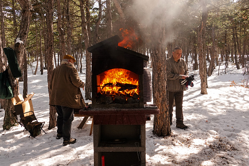 Barbecue in the forest, in winter