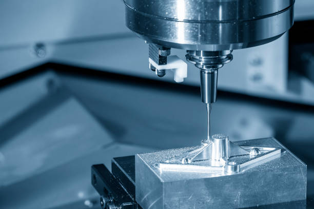 istock The CNC milling machine cutting injection mold part by solid ball end mill tool. 1467607550