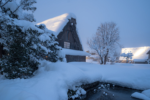 Gifu, Japan - 29 January, 2023: Traditional village and House Gassho style cottage of UNESCO world heritage sites in Shirakawa-go village, the area with white snow cover on winter season at Gifu, Japan