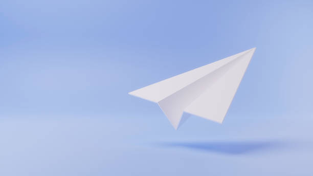 istock Paper plane icon, white paper folded into shape on light blue backdrop, isolated with shadow. 3d rendering 1467615532