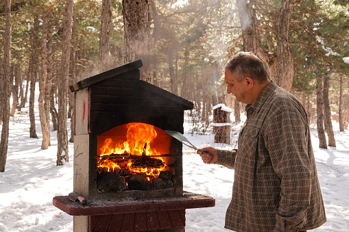 Barbecue in the forest, in winter