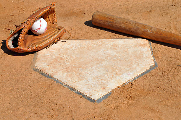 istock Baseball, Bat and Glove at Home Plate 146762033