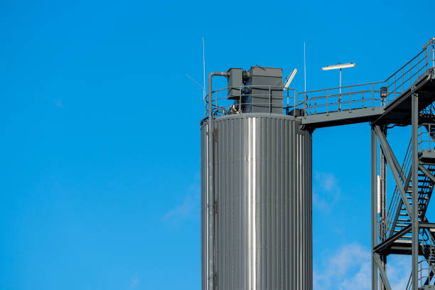 istock Low angle view of storage tank against clear blue sky 1467620365