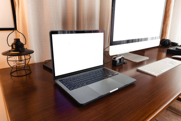 istock Computer  and Laptop  on the desk mock up at home office 1467622071