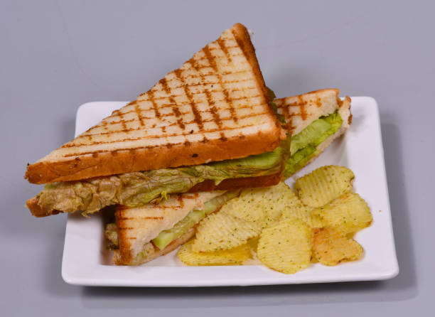istock Grilled Veg Sandwich served with some Potato Crispies 1467627169