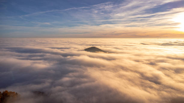 istock Beautiful sunset with an inversion that looks like a flowing sea 1467627412
