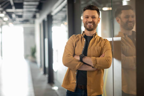 istock Successful Businessman Posing Standing In Doorway In Office 1467628300