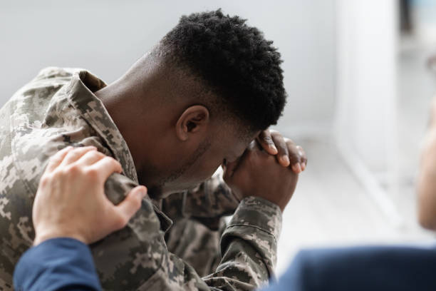 istock Unrecognizable man placing hand on black soldier shoulder 1467628367