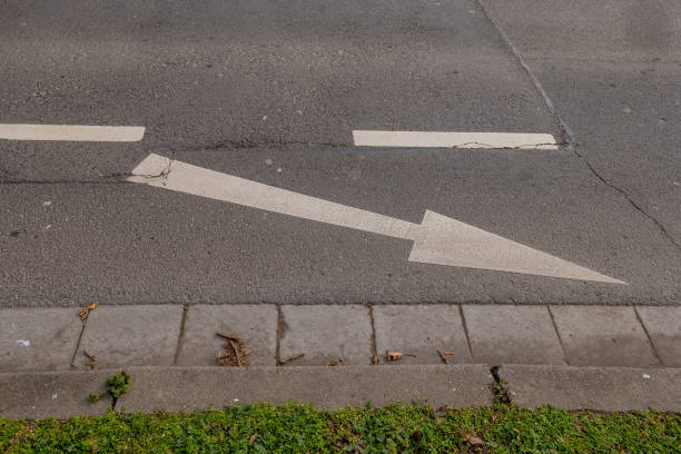istock an arrow on a road 1467629661