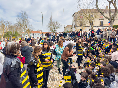 Setubal, Portugal - February 17, 2023: Children having fun at the Children's Carnival in the parish of Vila Nogueira de Azeitão.
