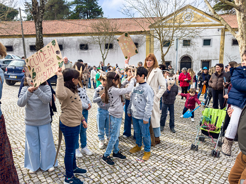 Setubal, Portugal - February 17, 2023: Children having fun at the Children's Carnival in the parish of Vila Nogueira de Azeitão.