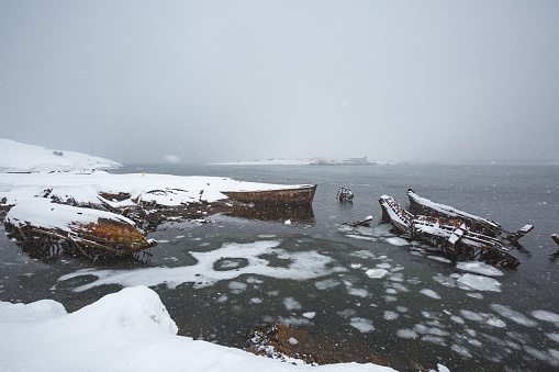 Ship graveyard near Triberka. Murmansk region, Russia