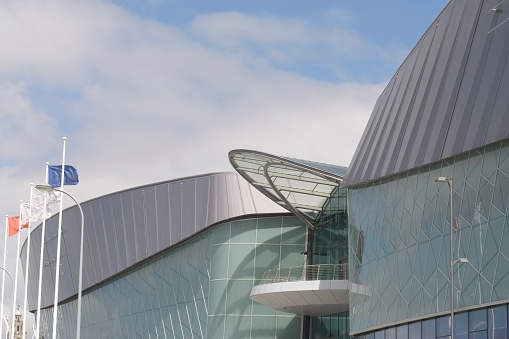 Modern curved building of glass and steel on Liverpool's waterfront