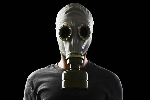 man with gas mask clipping path included