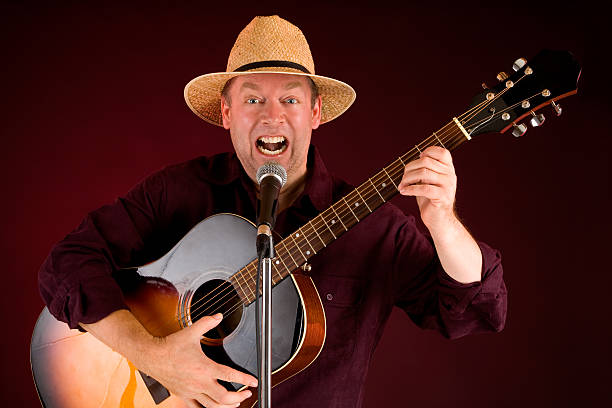 istock Singing and Playing Acoustic Guitar 146765061
