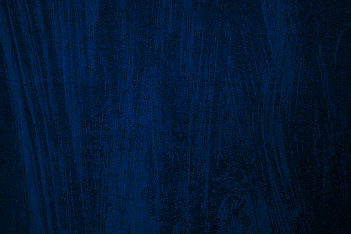 Navy blue abstract pattern with stripes lines. Painted wall surface. Dark grunge texture background for design. Close-up.