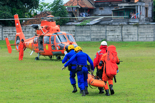 Yogyakarta, Indonesia, July 26 2016. The National Search and Rescue Agency's quick response action evacuated victims of natural disasters using helicopters.