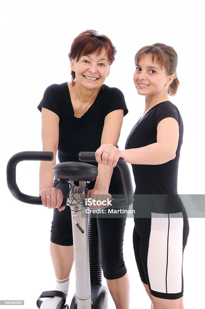 Mulher idosa com Treinador - Royalty-free Adulto Foto de stock