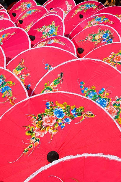istock Hand painted pink umbrellas in Thailand 146766260