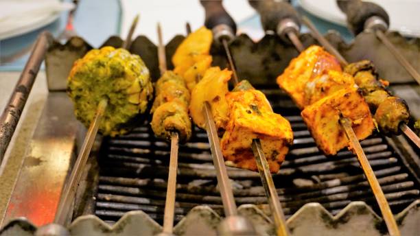 closeup of preparation of vegetarian barbeque dishes - stater imagens e fotografias de stock