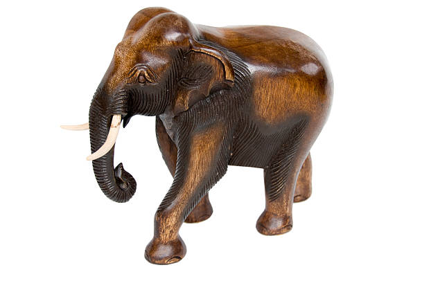 istock wooden elephant isolated over white 146766610