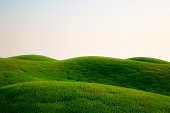 istock A field full of green grass and hills 146766798