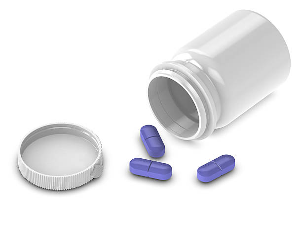 Pill Container with Drugs stock photo