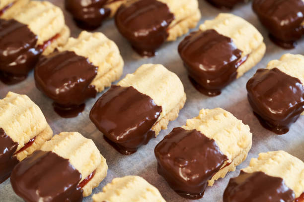 istock Christmas cookie filled with jam and dipped in chocolate 1467674468