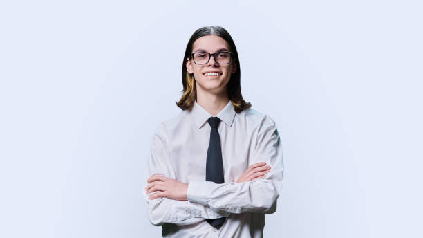 istock Portrait of confident young male student on white studio background 1467674586