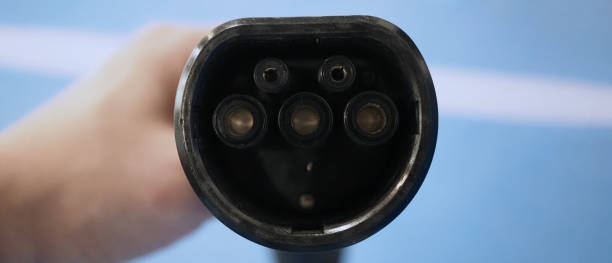 istock EV Charger quick charge type at car parking which DC Charging faster than AC system. EV Charger car station charging use AC socket plug for electric engine vehicle. Future transport energy technology 1467674651