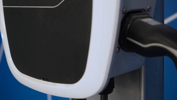 istock EV Charger quick charge type at car parking which DC Charging faster than AC system. EV Charger car station charging use AC socket plug for electric engine vehicle. Future transport energy technology 1467674751