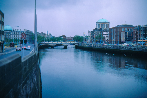 1980s old Positive Film scanned, the view of Liffey river from bridge, Dublin, Ireland.