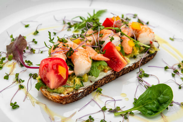 istock Bruschetta with shrimps, tomatoes and gluacomoli sauce 1467686826