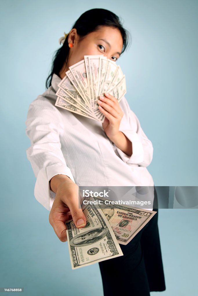 Woman with Money Businesswoman offering some free cash Abundance Stock Photo