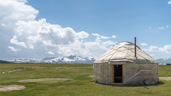 Traditional Yurt tent at the Song Kul lake plateau in Kyrgyzstan. Yurt tents are traditional, portable tents made of felt that are used as a form of accommodation in the country.